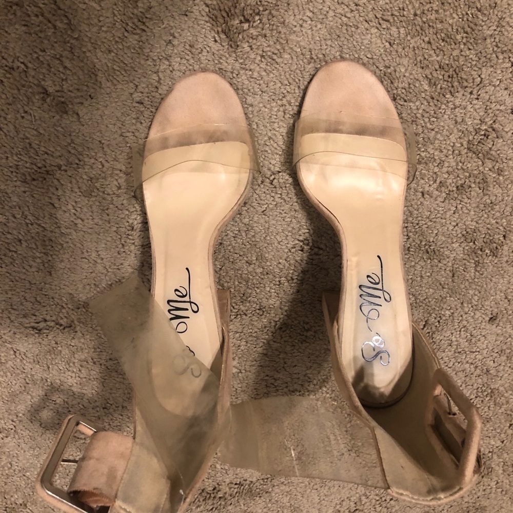 Nude colored clear strapped heels